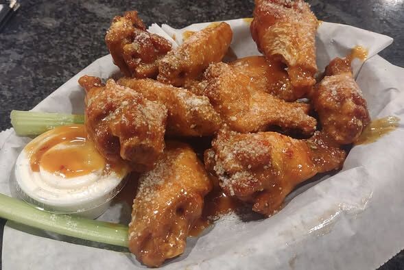 Honey gold wings in a basket